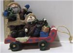 Chr figure santa and snowman on sled